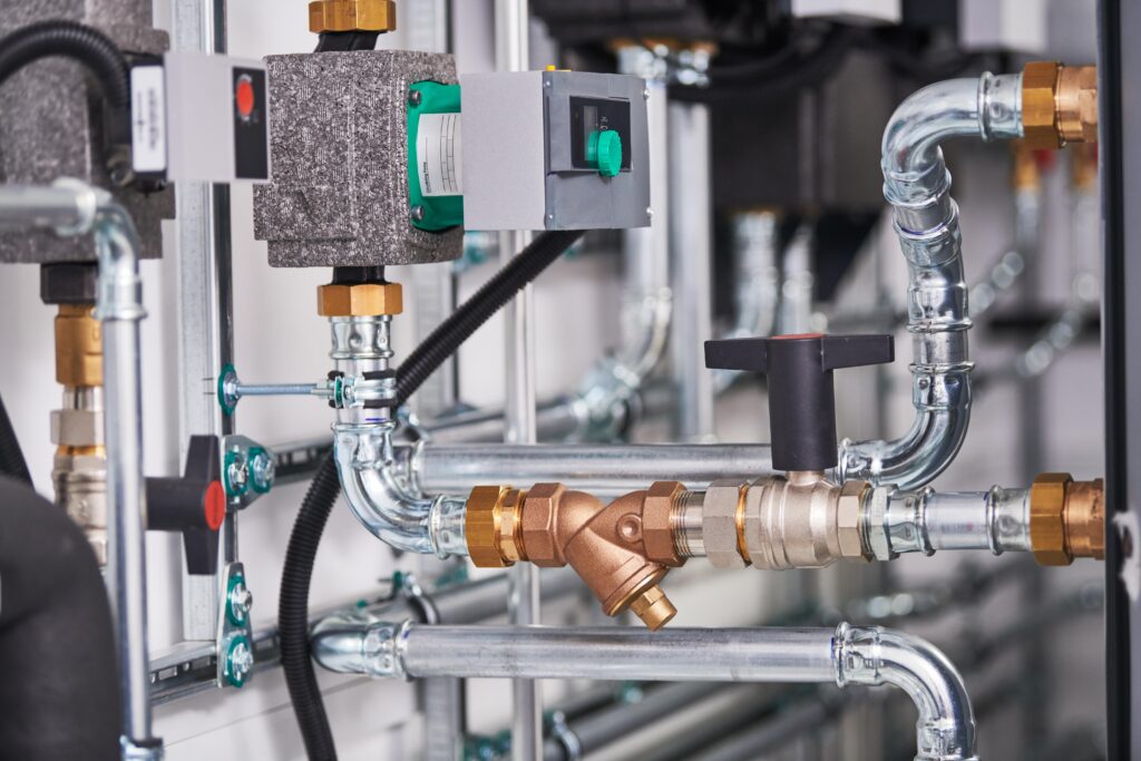 tubular fitting with valves for plumbing system