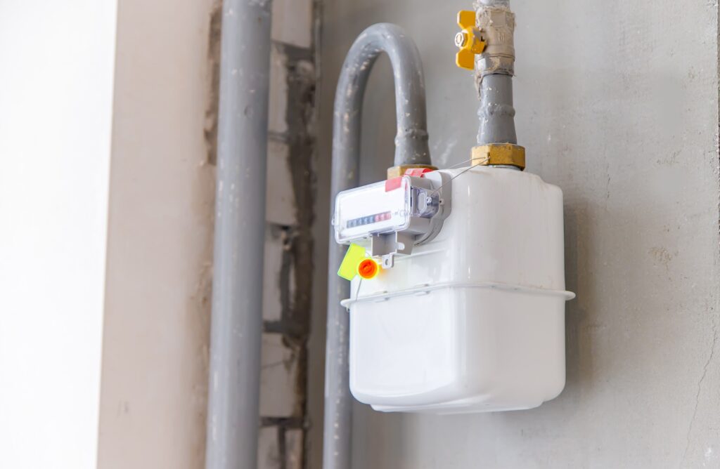 gas meter on the wall in the house. Selective focus.